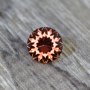 1.52 ct Precision-Cut Malaya Garnet – "Olivera" Round Brilliant
