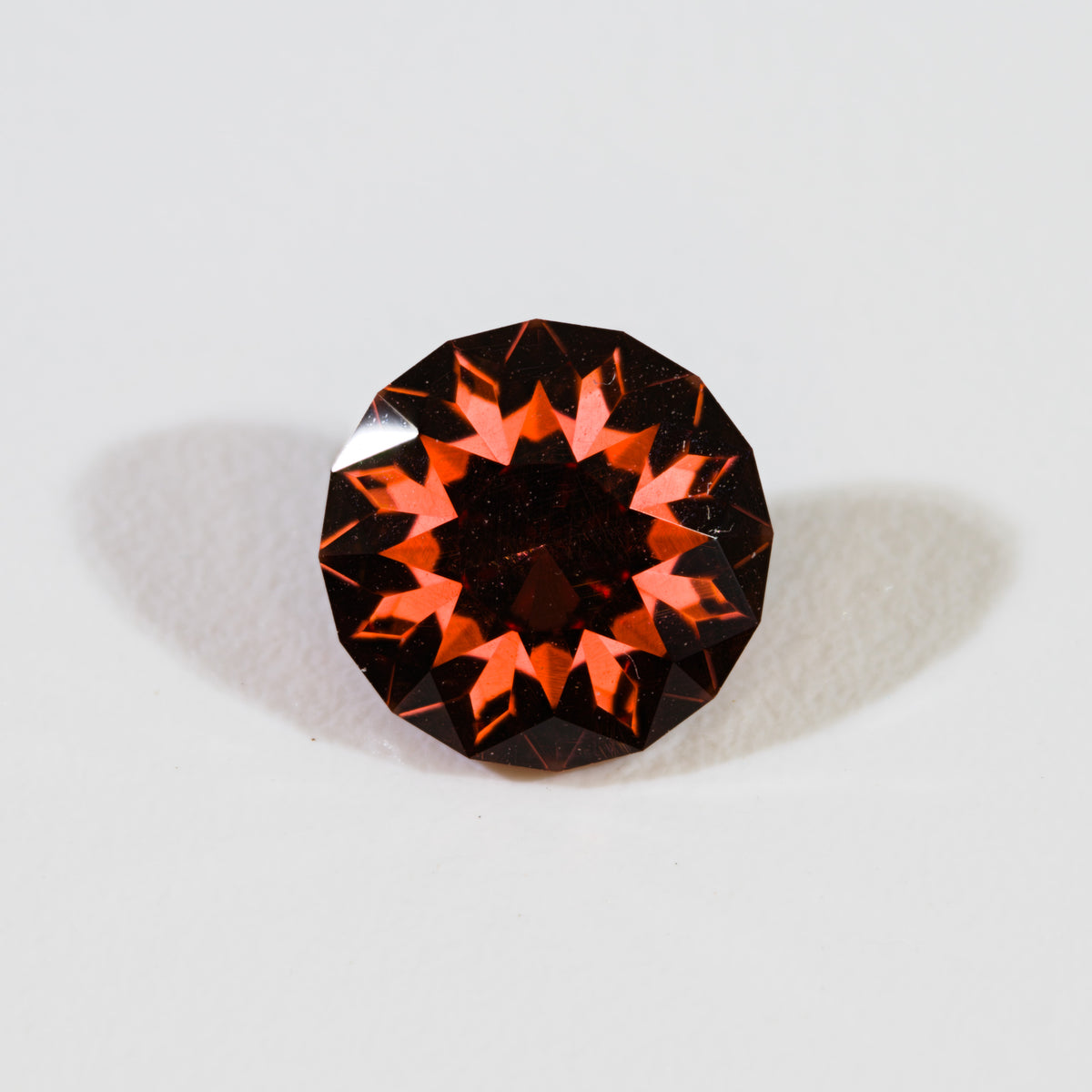 1.52 ct Precision-Cut Malaya Garnet – "Olivera" Round Brilliant