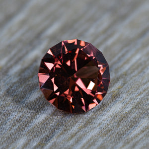 1.74 ct Malaya Color Change Garnet from Tanzania. Round Brilliant Design.