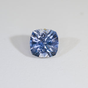 Cushion cut Icy Sky Blue Sapphire with Rose Channels on white background