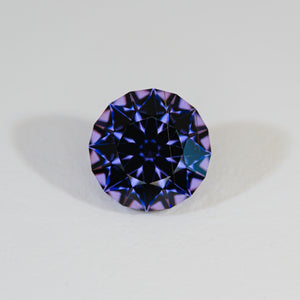 Spinel Tunduru Vivid Blue Purple Color Shift Precision Round Brilliant on white background