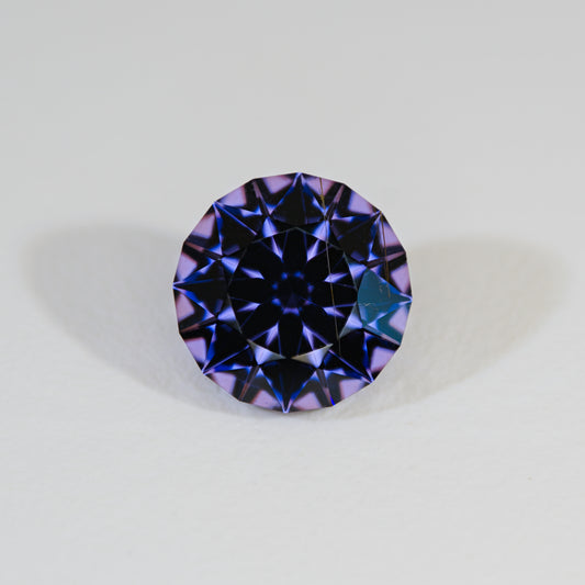 Spinel Tunduru Vivid Blue Purple Color Shift Precision Round Brilliant on white background