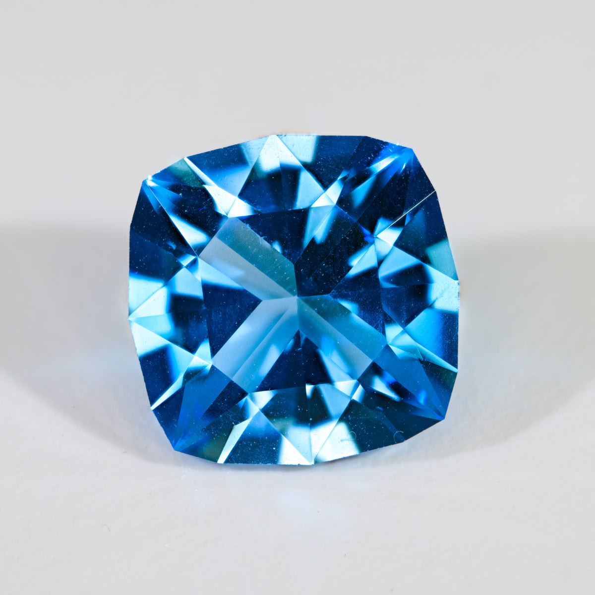 5.15 ct Precision Cushion: Fire & Geometric Precision