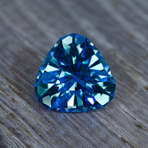 8.26 Royal Blue Topaz Trilliant Design (Treated)